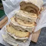 Cinnamon peach loaf sliced with visible swirl