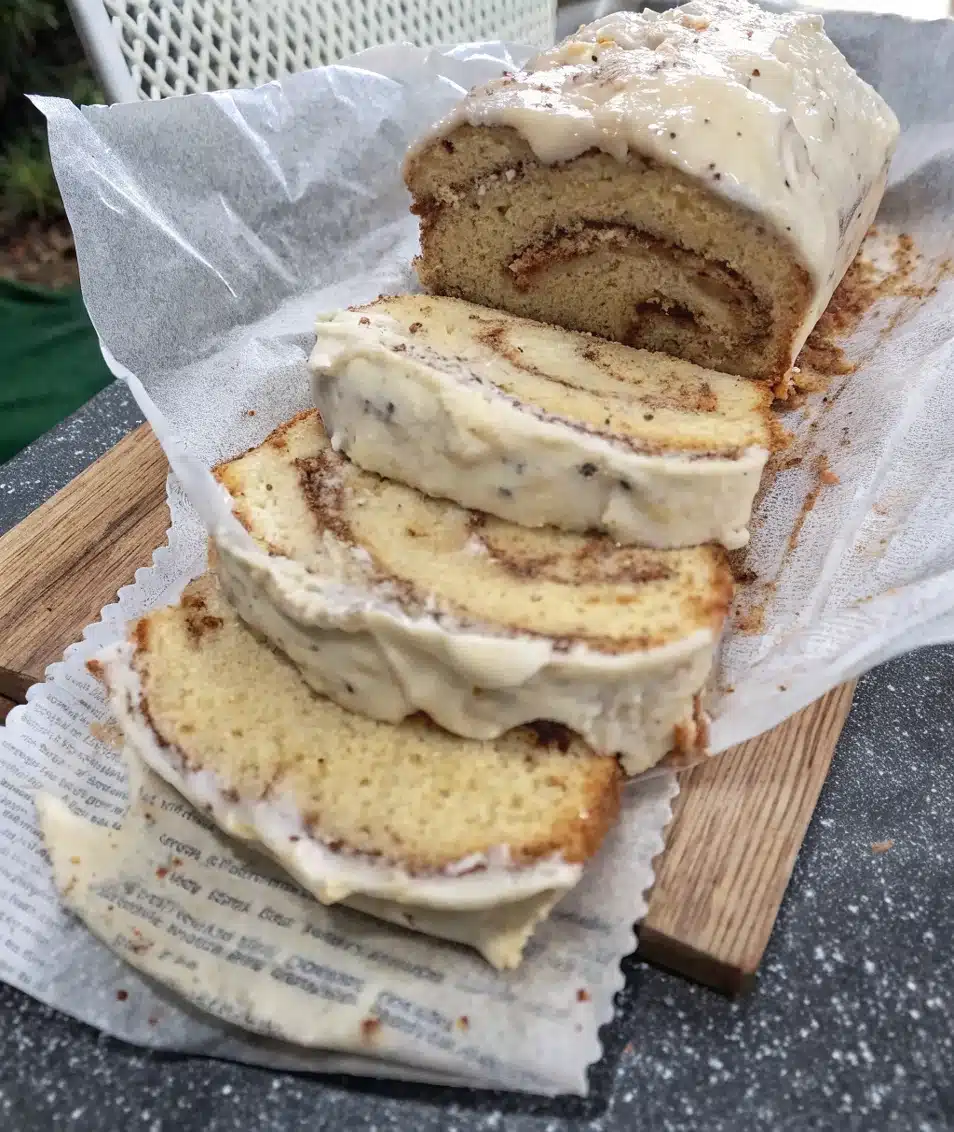 Cinnamon peach loaf sliced with visible swirl