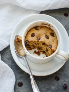 Chocolate chip cookie in a mug with ice cream