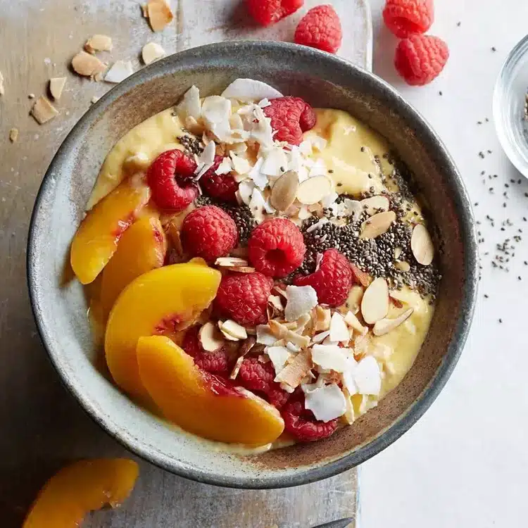 Mango smoothie bowl with toppings